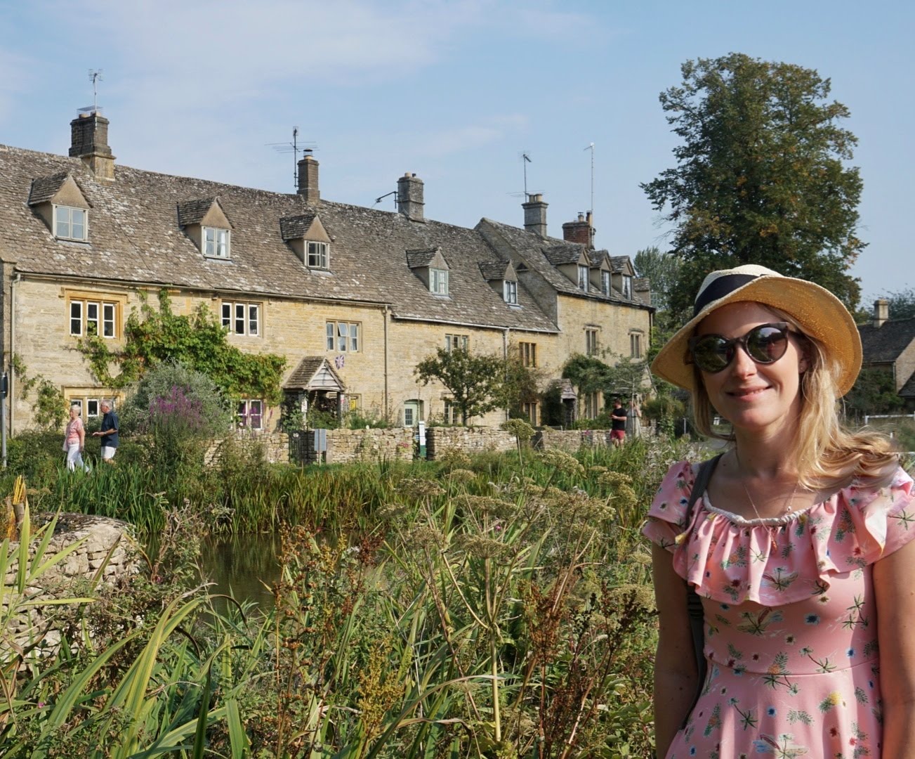 Me in front of golden cottages in Lower Slaughter
